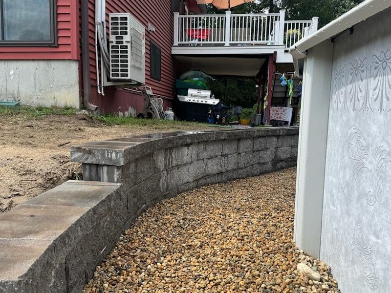 Project Stunning Backyard Stone Retaining Wall in Lancaster MA image